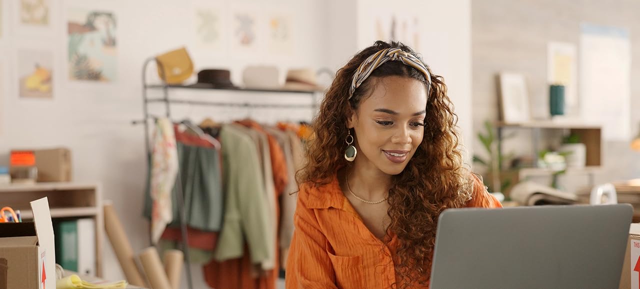 photo of a woman looking at her computer